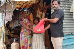 Distributing the Food Packets to the Needy slums